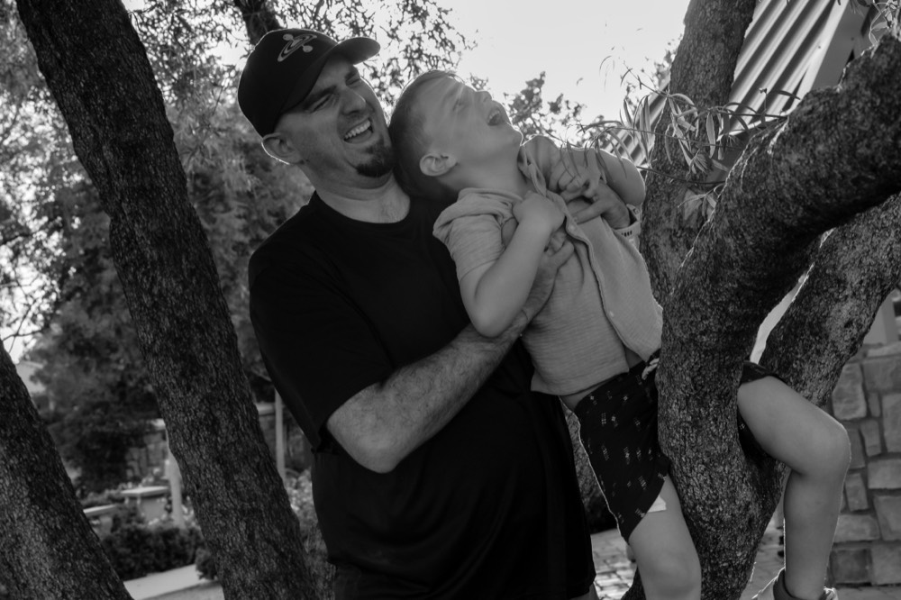 Pete Foldes laughing with his son Cy