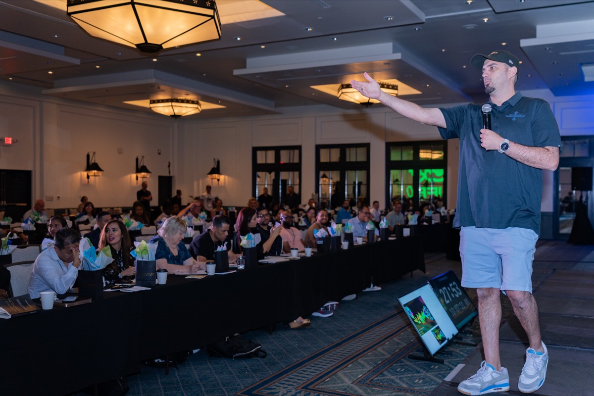 Pete Foldes speaking to a full room at the Life 180 Aligned Wealth Experience